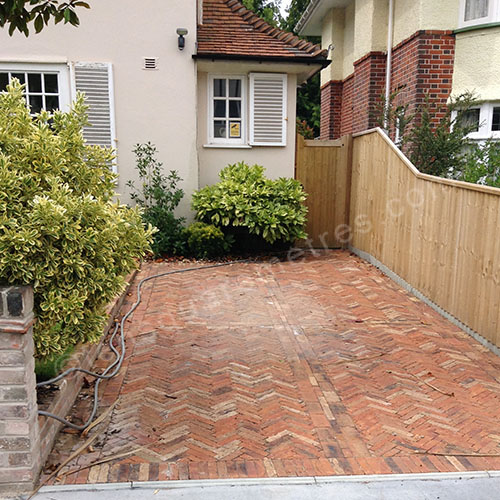 finished drive with herringbone clay pavers
